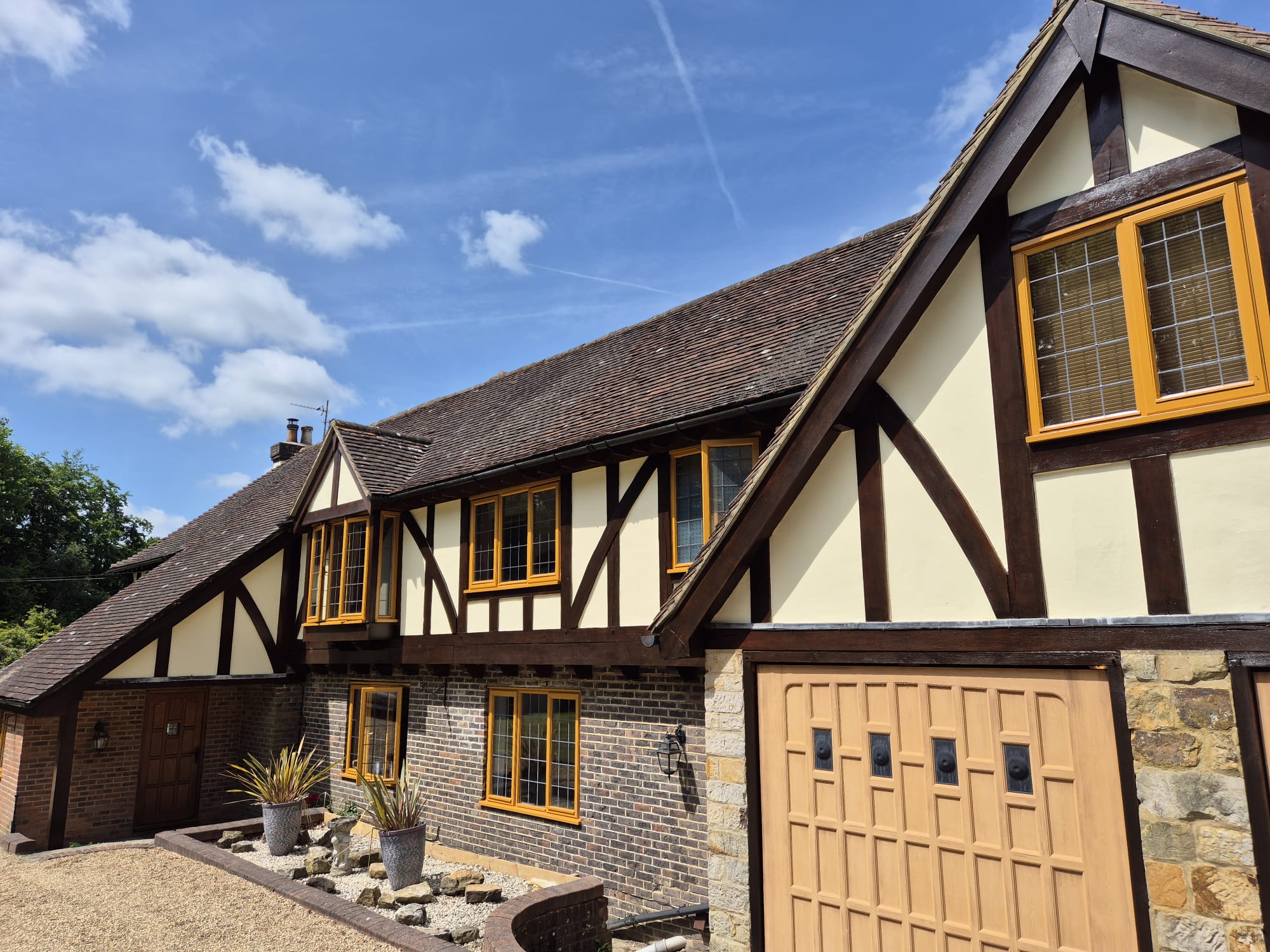 Residential building exterior painting by Mark Pinchin Painting and Decorating in Horsham